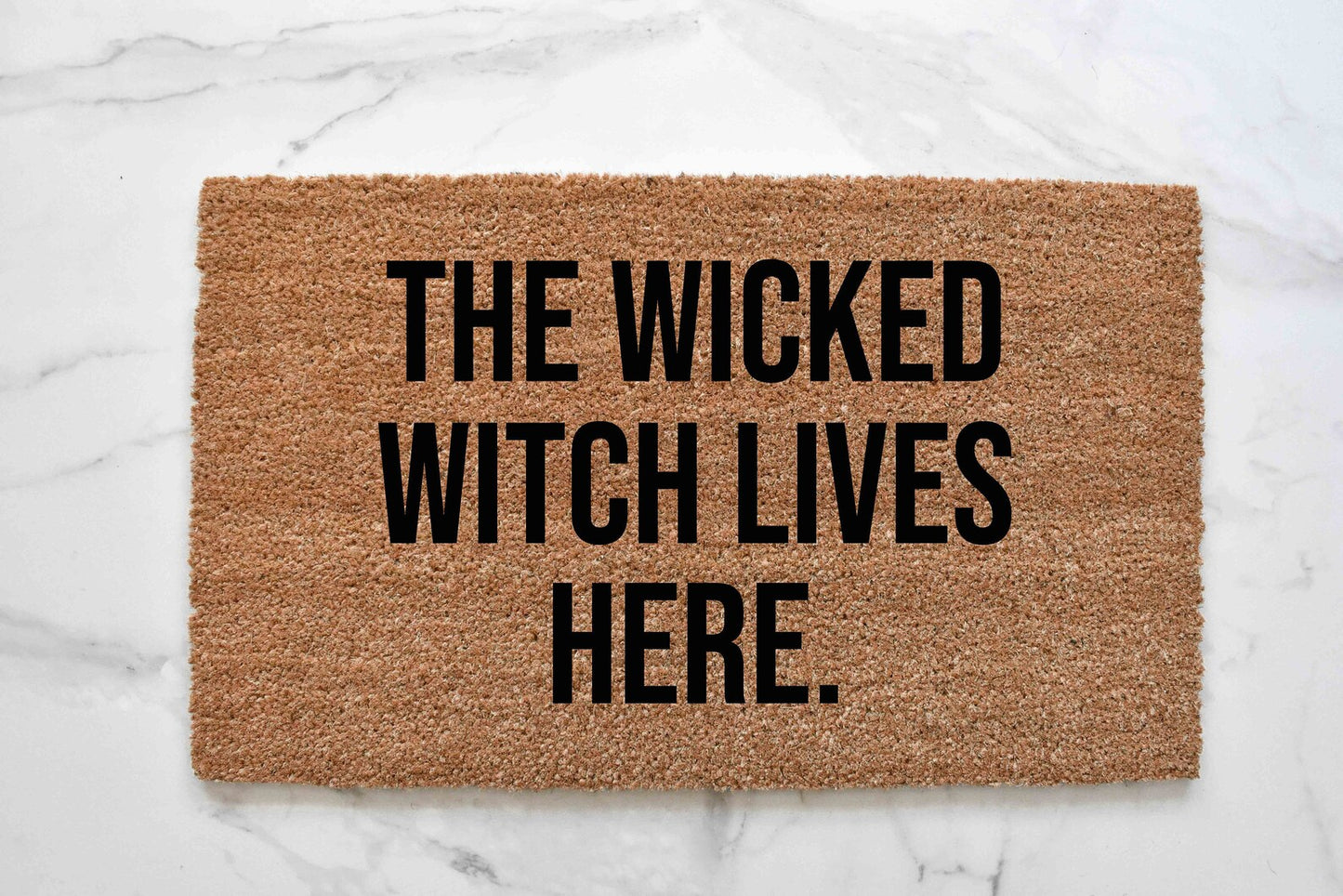 The Wicked Witch Lives Here Doormat